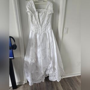 Elegant White Gown with Floral Details